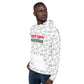 A man looking pensively to the side while wearing a white hoodie with a quirky all-over print of holiday icons, including 'Merry Happy Halogivemas' text in red and green.