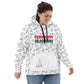 A smiling woman wearing her white hoodie, which is covered in a fun, festive print including Christmas trees, pumpkins, a Thanksgiving turkey and the words 'Merry Happy Halogivemas' in holiday colors.