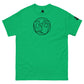  A bright green t-shirt is laid flat, featuring a circular emblem in black line art on the chest. The emblem shows a can of beans and a packet of bologna with a "+" sign between them. The t-shirt also has a small black logo patch on the right sleeve. The bold green color and playful design against the plain background give the shirt a relaxed, stylish, and fun vibe.