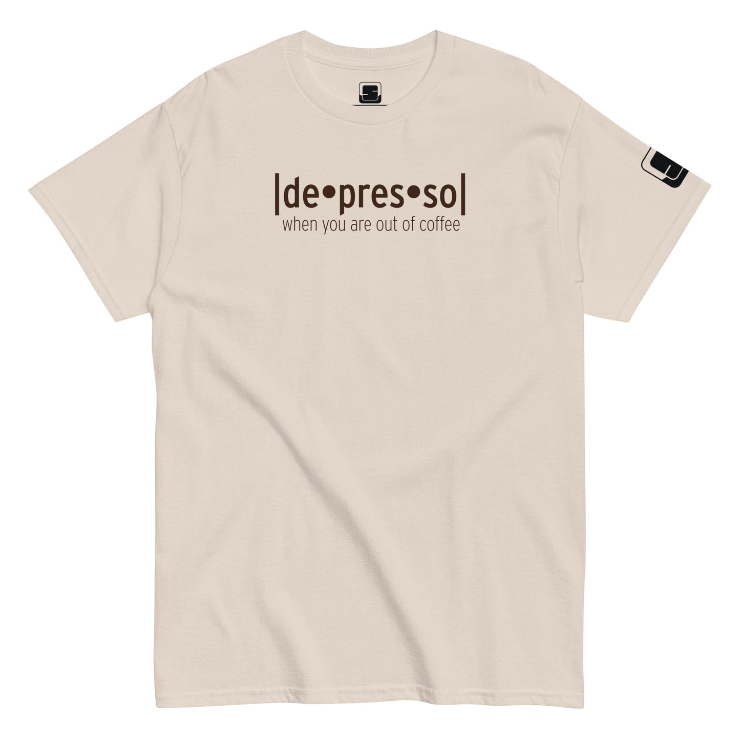 Natural sand colored t-shirt with the humorous phrase '[de]presso' followed by 'when you are out of coffee' in dark lettering, featuring a small black logo patch on the sleeve, displayed on a flat surface with a white background.