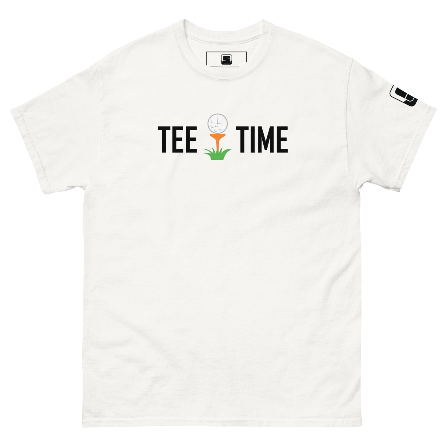 The image displays a plain white t-shirt laid flat and centered. On the chest area is printed "TEE TIME" in bold black letters, with a graphic of a golf ball on a tee and a small green tuft of grass below it. The t-shirt has a black square logo on the right sleeve. The background is a clean, solid white, ensuring the focus remains on the t-shirt's graphic and design.