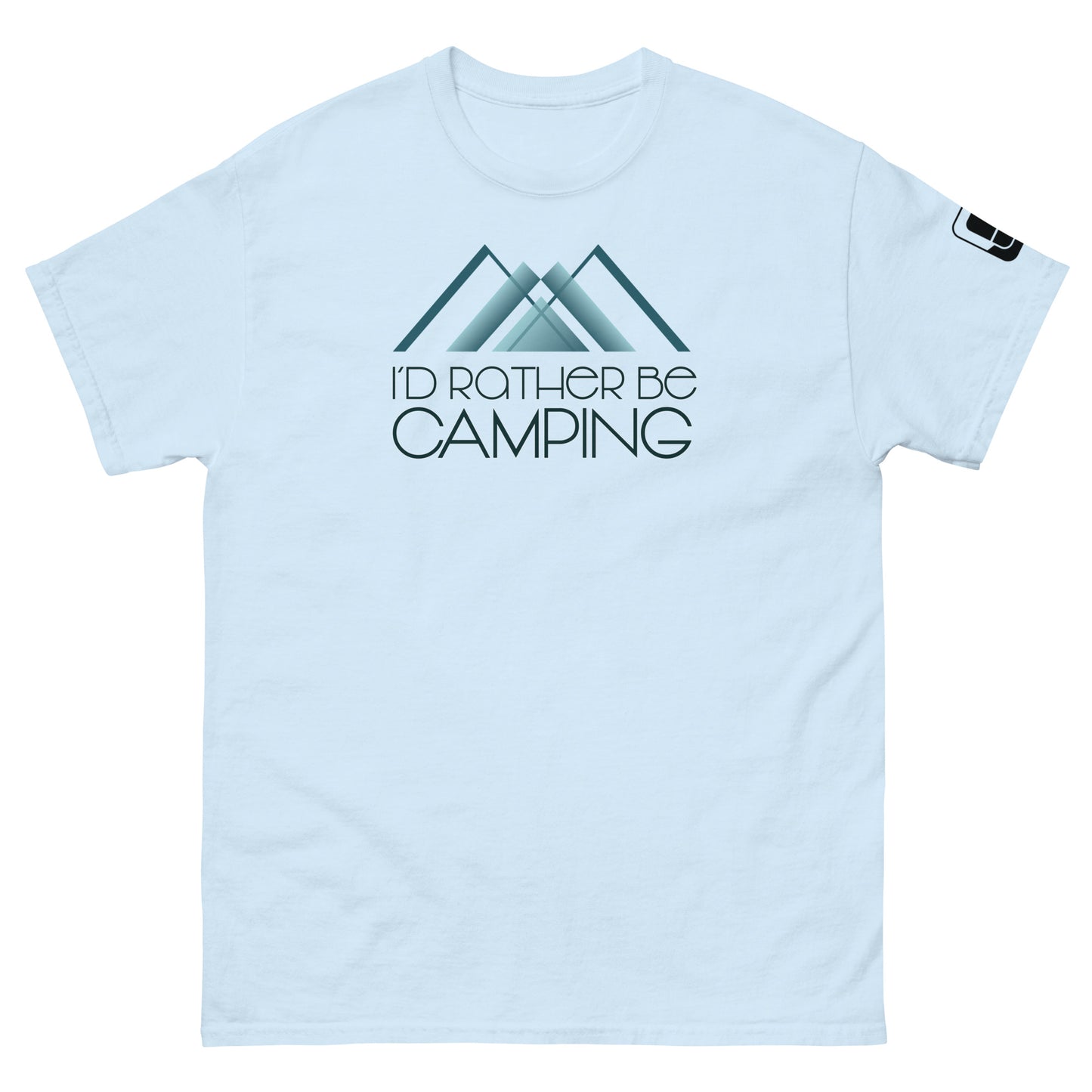 
A light blue t-shirt featuring a design with two stylized teal mountains and the phrase "I'D RATHER BE CAMPING" in black, elegant font just beneath the peaks. The graphic is positioned centrally on the chest area. The t-shirt includes a small logo patch on the right sleeve, complementing its casual outdoor aesthetic.