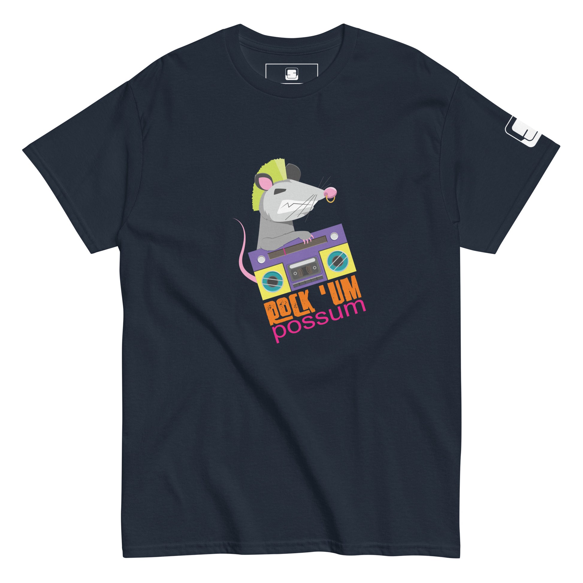 A navy blue t-shirt showcases a vibrant graphic of a possum with a neon green mohawk. The possum is animatedly operating a purple and blue boombox. Below the possum, the phrase "ROCK 'UM POSSUM" is displayed in bold, multicolored letters, capturing a rock and roll theme. The overall design is playful and stylish, combining elements of music and quirky animal humor.