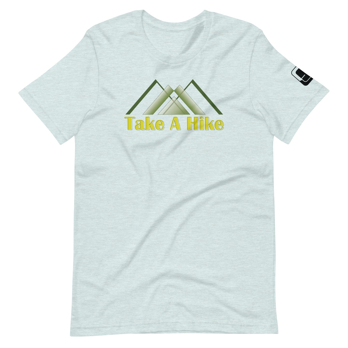 A light gray t-shirt featuring a stylized design of green mountains above the phrase "Take A Hike" in bold, yellow text. The graphic design includes three overlapping mountain peaks created with clean lines and geometric shapes. The t-shirt has a relaxed fit with a crew neck and short sleeves, and a small black logo patch is visible on the right sleeve. It is laid out flat against a white background, highlighting the simple and outdoorsy theme of the shirt.