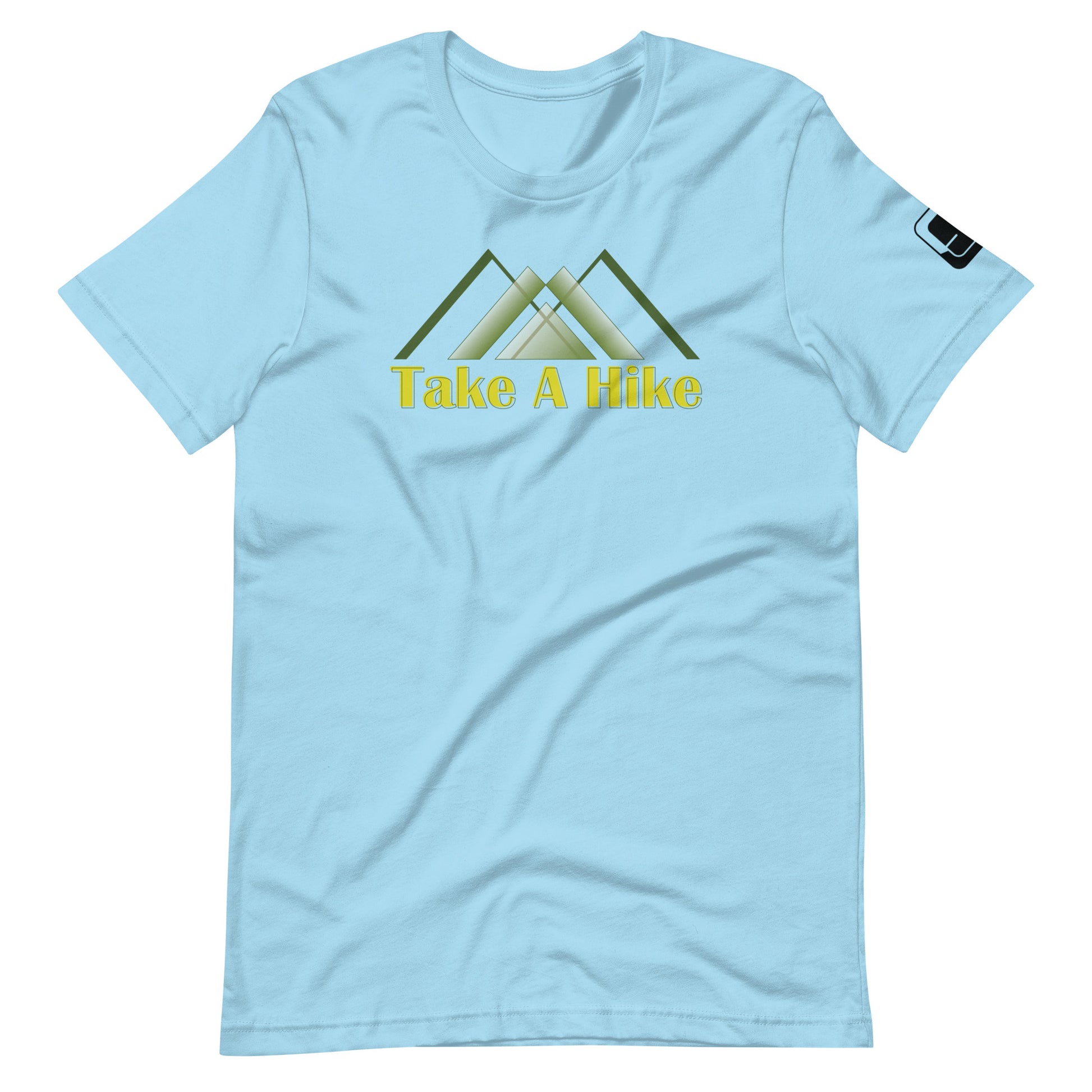 
A light blue t-shirt with a design featuring stylized green mountains above the phrase "Take A Hike" in yellow, bold letters. The mountains are depicted in a simple, modern style with overlapping triangular shapes. The t-shirt has a casual fit with a round neckline and short sleeves, and there's a small black logo patch on the right sleeve. The shirt is laid flat on a white background, emphasizing the clean, bright design and relaxed style of the garment.