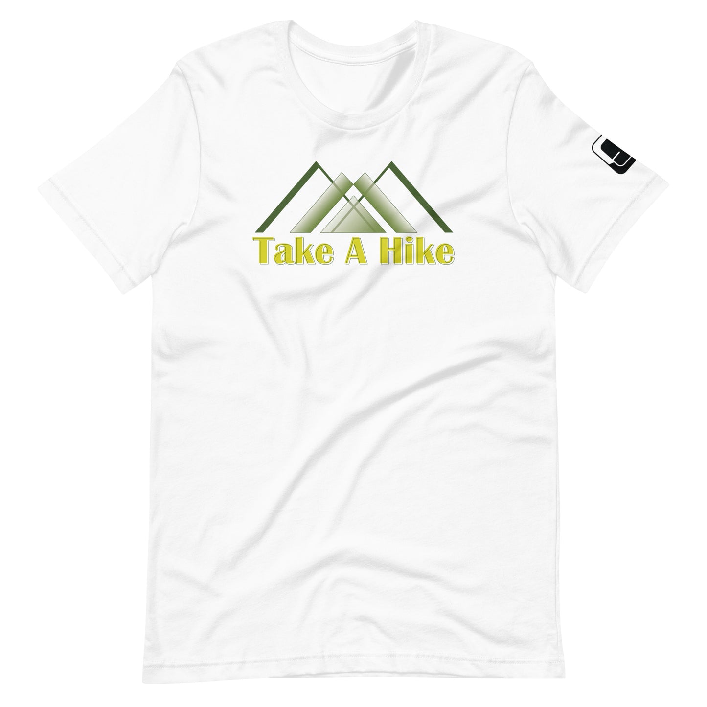 A plain white t-shirt with a design featuring stylized green mountains above the phrase "Take A Hike" in yellow, bold letters. The mountains are depicted in a simple, modern style with overlapping triangular shapes. The t-shirt has a casual fit with a round neckline and short sleeves, and there's a small black logo patch on the right sleeve. The shirt is laid flat on a white background, highlighting the vibrant design and clean lines of the garment.