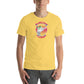 A young man is shown wearing a vibrant yellow t-shirt adorned with a fun graphic design. The design features a cartoon possum's head in sunglasses, encircled by the phrases "AWESOME" and "POSSUM" in colorful, bold text against a backdrop of pink and orange sunset stripes. The playful imagery is centered on the shirt, conveying a casual and lighthearted aesthetic.