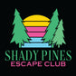 This image features a logo for "Shady Pines Escape Club," inspired by the nursing home from the television show "Golden Girls." The logo includes two stylized evergreen trees framing a colorful sunset with horizontal bands of yellow, pink, purple, and blue. The name "SHADY PINES" is prominently displayed in large, bold green letters at the top, while "ESCAPE CLUB" is shown in smaller pink text below. 