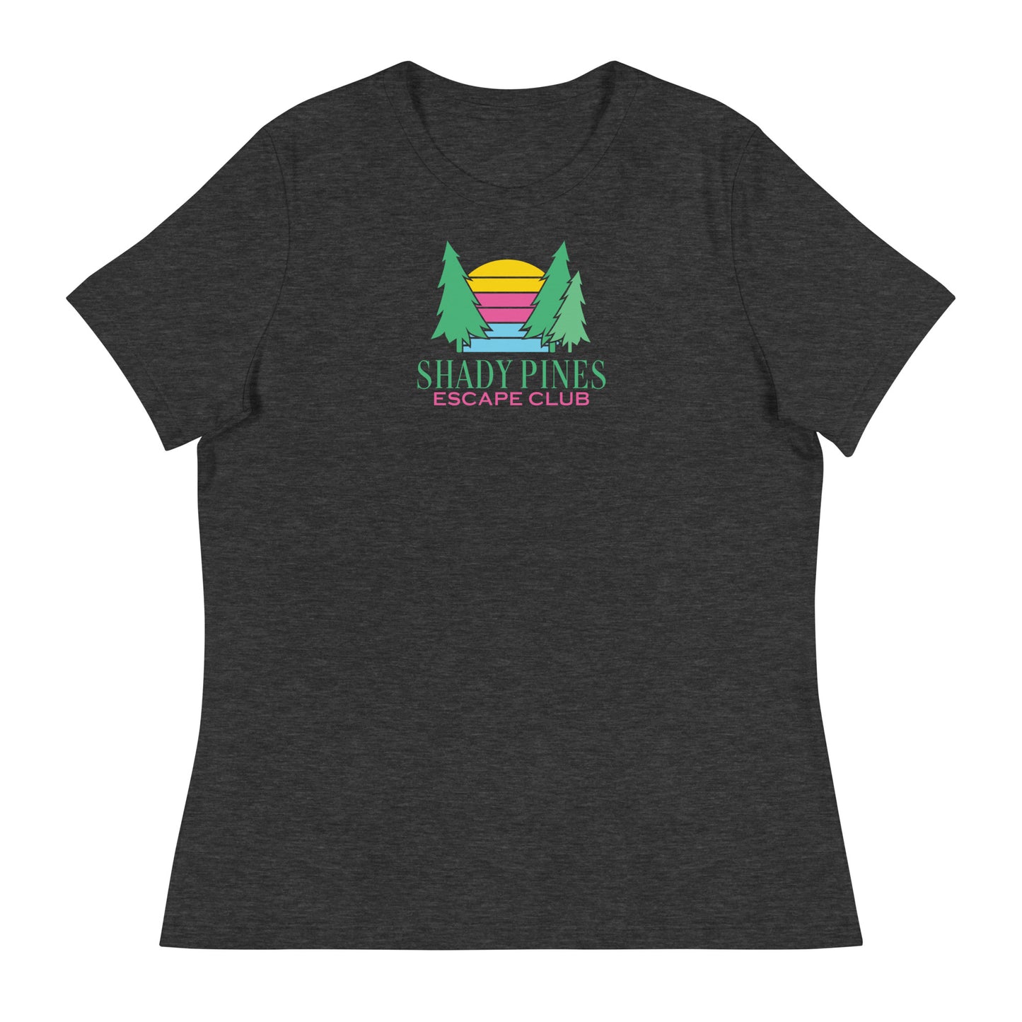 A dark gray t-shirt featuring the "Shady Pines Escape Club" logo centered on the front. The logo includes two green pine trees framing a stylized sunset with horizontal stripes in yellow, pink, purple, and blue. Below the graphic, "SHADY PINES" is written in bold green text, with "ESCAPE CLUB" in smaller pink letters underneath. The design is vibrant and modern, standing out against the dark fabric, making it perfect for casual outdoor wear.