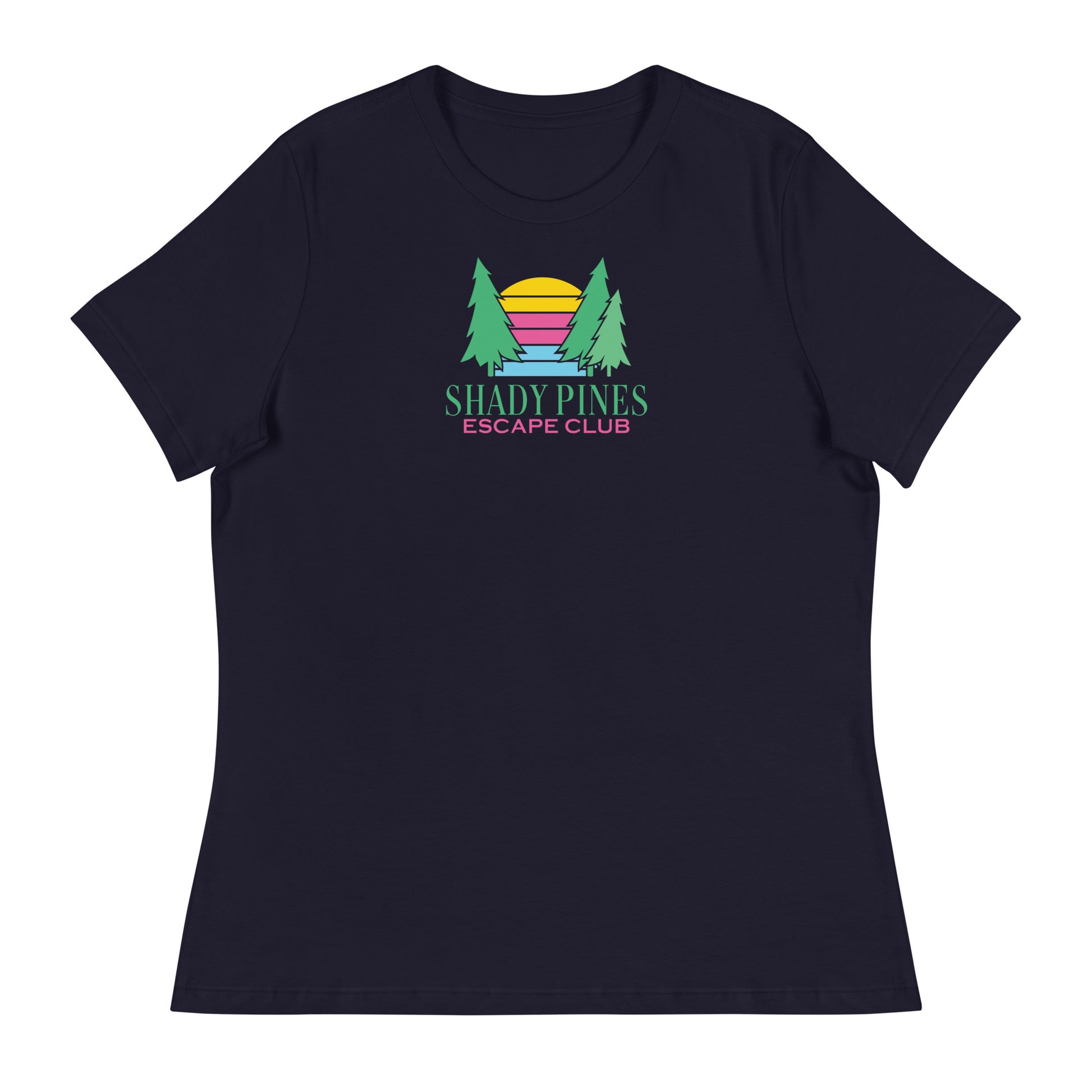 A navy blue t-shirt showcasing the "Shady Pines Escape Club" logo centered on the chest. The design features two green pine trees flanking a colorful, stylized sunset with horizontal stripes in yellow, pink, purple, and blue. Beneath the graphic, "SHADY PINES" is displayed in bold green lettering, followed by "ESCAPE CLUB" in smaller pink text. The vibrant colors of the logo stand out against the deep navy background, creating a stylish and versatile look suitable for casual occasions.